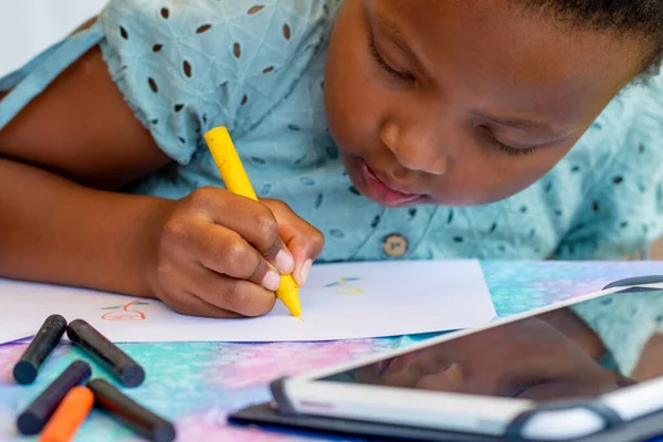 Extreme Close Portrait African Kid Drawing Wax Crayons Table — Stock Photo, Image