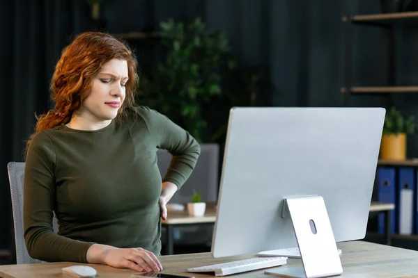 Young Businesswoman Having Back Pain While Sitting Office Desk — Stock Photo, Image