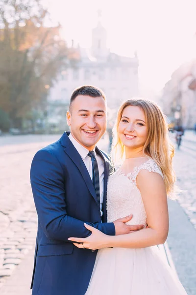 Newlyweds Hug Look Camera Bride White Dress Lace Groom Stylish — Stock Photo, Image