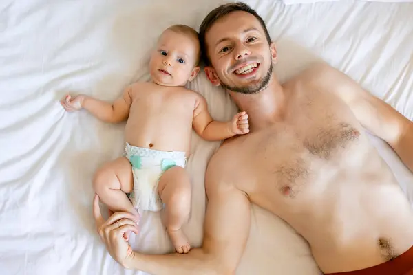 Top View Father Smiling Bed Little Baby Boy — Stock Photo, Image