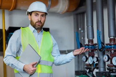 unexperienced technician engineer looking puzzled