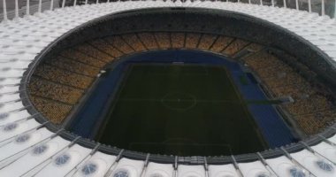 Olimpik Stadyum. Kyiv. Ukrayna. Şehir merkezi. Futbol sahası. Çağdaş tasarım. Hava fotoğrafçılığı. Tribünler. Hayranlar için yerler.