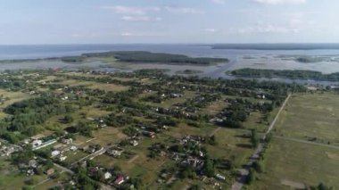 The village of Strakholissya. The general plan of the village near the Chernobyl exclusion zone. Dnepr River. Summer. Aerial. Kyiv Oblast, Ukraine.