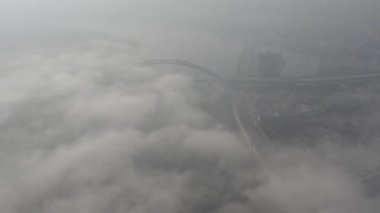 Podolsko-Voskresensky bridge. Bridge construction. Kyiv. Ukraine. Aerial. Fog. 
