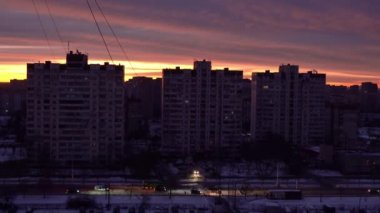 Timelapse of the city of Kyiv at dawn during the blackout. City without light. Frosty morning.