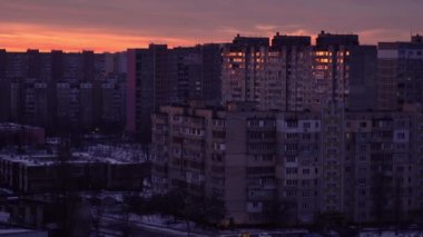 Timelapse of the city of Kyiv at dawn during the blackout. City without light. Frosty morning.