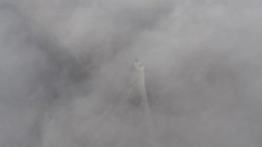 Aerial drone view View Of North or Moscow Bridge Kiev. Ukraine over Dnieper. City view. Traffic on the bridge. Fog.