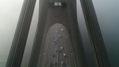 Aerial drone view View Of North or Moscow Bridge Kiev. Ukraine over Dnieper. City view. Traffic on the bridge. Fog.