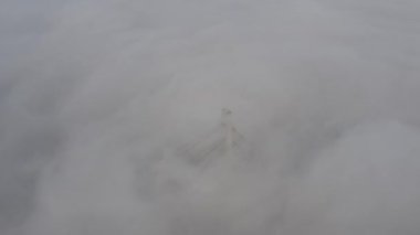 Aerial drone view View Of North or Moscow Bridge Kiev. Ukraine over Dnieper. City view. Traffic on the bridge. Fog.