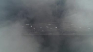 Aerial drone view View Of North or Moscow Bridge Kiev. Ukraine over Dnieper. City view. Traffic on the bridge. Fog.