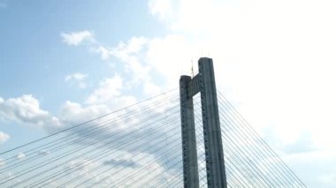 Aerial survey of the south bridge in Kyiv through the Dnieper. Ukraine. Summer. Warm morning.