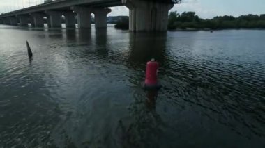 Aerial survey of the south bridge in Kyiv through the Dnieper. Ukraine. Summer. Warm morning.