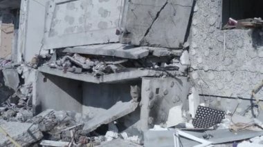 Ruins of house, damaged by shelling, Russian attack. Destruction caused by war in Ukraine, collapsed building.  Mariupol. Aerial.