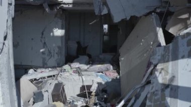 Ruins of house, damaged by shelling, Russian attack. Destruction caused by war in Ukraine, collapsed building.  Mariupol. Aerial.