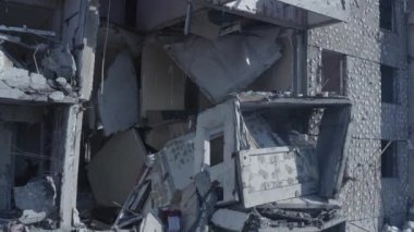 Ruins of house, damaged by shelling, Russian attack. Destruction caused by war in Ukraine, collapsed building.  Buzova. Aerial.