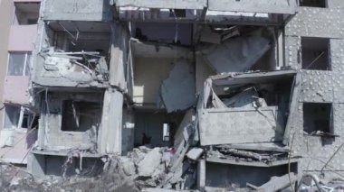 Ruins of house, damaged by shelling, Russian attack. Destruction caused by war in Ukraine, collapsed building.  Buzova. Aerial.