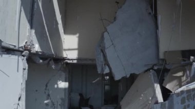 Ruins of house, damaged by shelling, Russian attack. Destruction caused by war in Ukraine, collapsed building.  Buzova. Aerial.