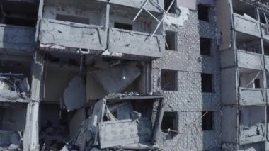 Ruins of house, damaged by shelling, Russian attack. Destruction caused by war in Ukraine, collapsed building.  Buzova. Aerial.