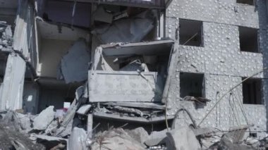 Ruins of house, damaged by shelling, Russian attack. Destruction caused by war in Ukraine, collapsed building.  Buzova. Aerial.