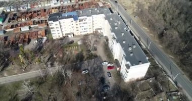 Destruction after an air strike on residential buildings of civilians. War in Ukraine. Destroyed houses. Aerial. Irpin City.