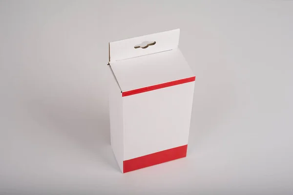 Verpackungsbox Aus Weißpapier Mit Hängendem Loch — Stockfoto