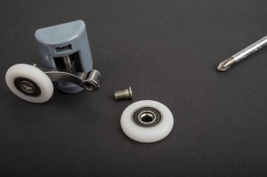 New shower roller for a moving door.