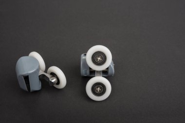 New shower roller for a moving door.