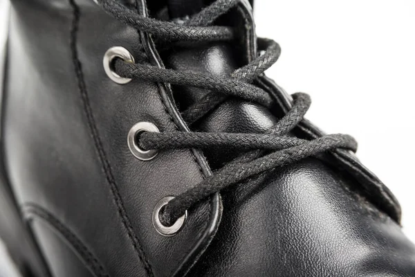 Detail of the shoe lace on a woman or working shoes
