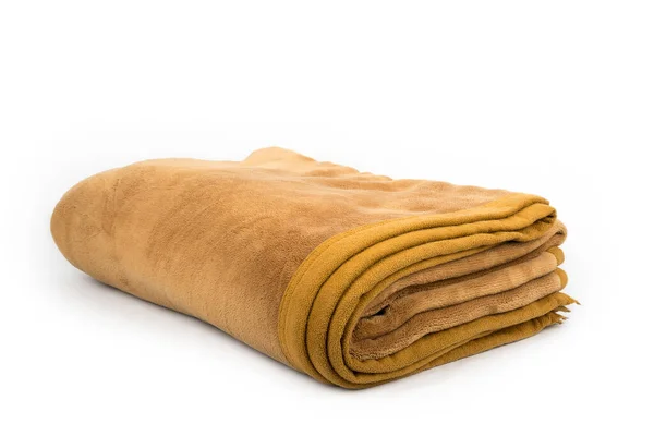 Brown folded blanket on a white background