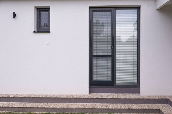 French balcony door with a stairs out