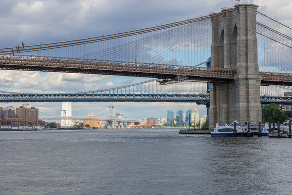 Close up view of Hudson river, Manhattan skyscrapers and Brooklyn bridge. USA.