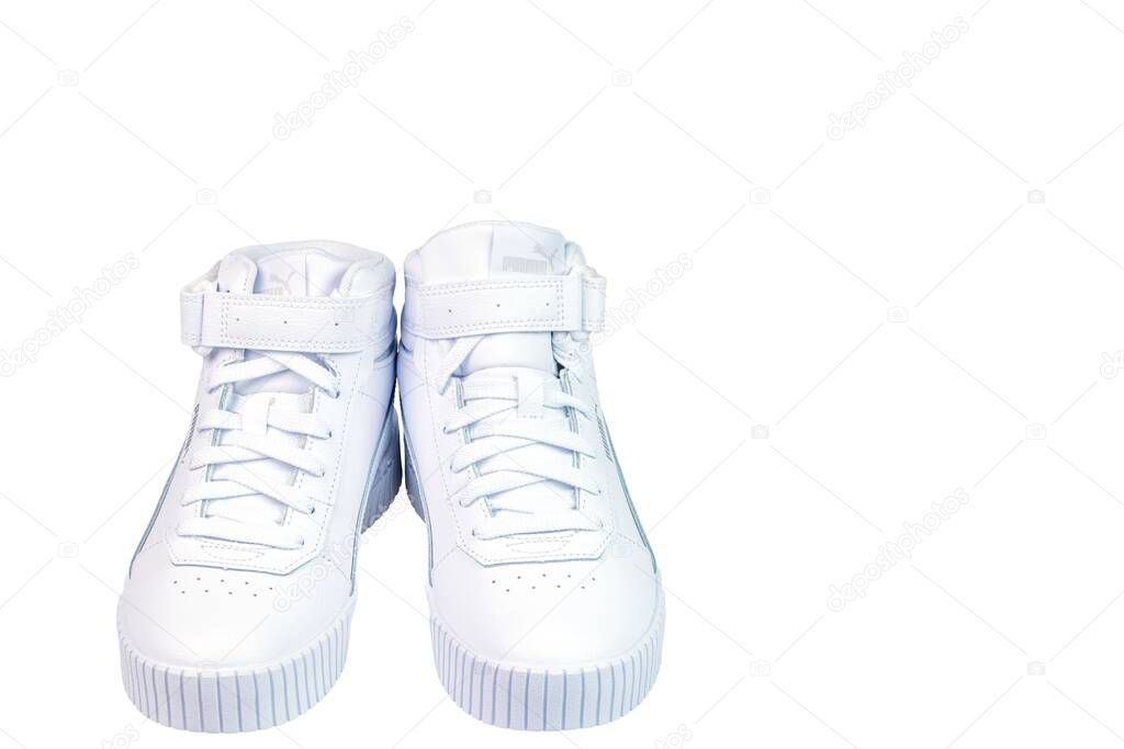 Close up view of white winter Puma sneakers isolated on white background. Sweden. Uppsala. 11.28.2022.