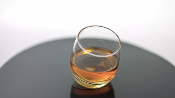 Close View Rotate Spinning Glass Alcoholic Drink Background Alcohol Concept — Stock Video