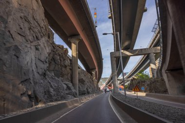 Technological view of road under bridge structures. Concept of modern technology. Stockholm. Sweden. Europe. 09.25.2022.