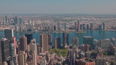 Beautiful aerial view of buildings against backdrop of landscape of Hudson River in Manhattan. New York, USA.