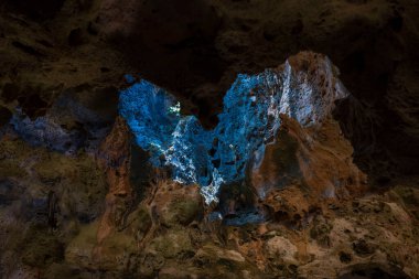 Close-up view of heart formed opening in Quadirikiri Caves ceiling. Aruba. 