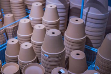 Close up view of sale of clay pots for planting flowers. Gardening concept. Sweden.