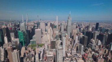 Beautiful panoramic view upp till down from above on roofs of skyscraper buildings. Manhattan, New York, USA.