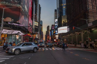 Beautiful night view of Broadway in Manhattan with traffic cars. New York. USA. 09.22.2022.