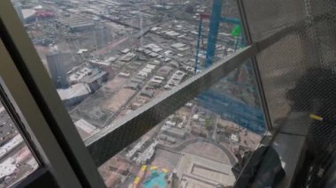 Close-up view of person jumping from Sky Pod table at Strat hotel-casino. Las Vegas. USA. 