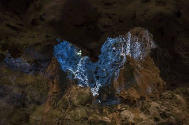 Beautiful view of heart formed opening in Quadirikiri Caves ceiling. Aruba. 