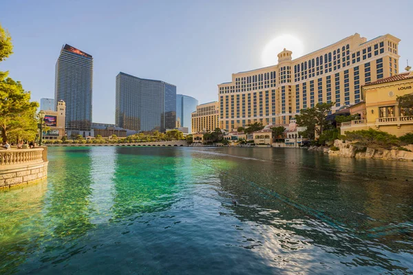 stock image Beautiful view of artificial pond near Bellagio casino hotel on Strip in Las Vegas at sunset. Las Vegas. Nevada. USA. 09.17.2022.