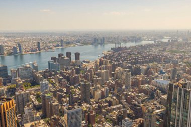 Beautiful aerial view of buildings against backdrop of landscape of Hudson River in Manhattan. New York, USA.