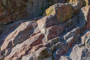 Kayalık duvarın yakın görüntüsü doğal arkaplan, doku. 