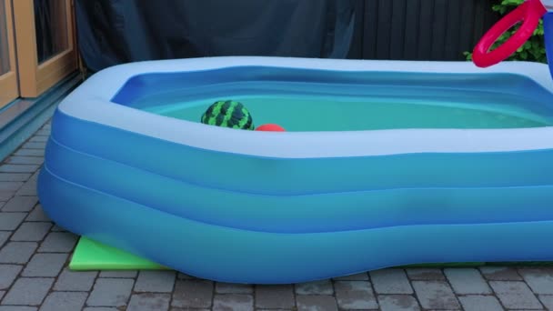 Close View Garden Plants Inflatable Children Water Pool Front Yard — Stock Video