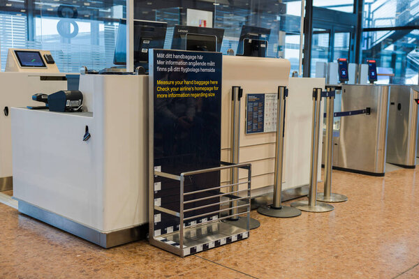 Close-up view of flight checkpoint desk at Arlanda Airport, Sweden. 