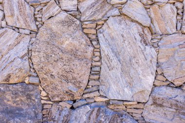 Yumuşak tonlarda doğal taşların güzel arkaplan dokusu.
