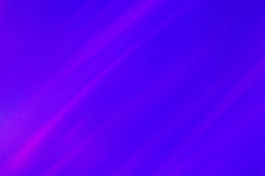 Pembe ışık arkaplanlı mor dokuların güzel manzarası.