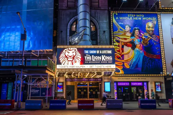 stock image Broadway Theatre at Night in Manhattan featuring the musical 'The Lion King'. New York. USA.