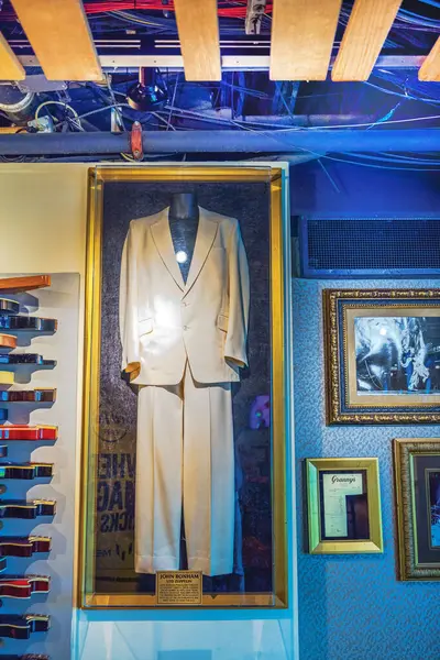 stock image Close up view of John Bonham's white suit from Led Zeppelin displayed in frame at Hard Rock Cafe in Manhattan. New York. USA. 